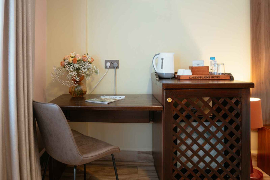 Deluxe Room with balcony and bathtub at Karen Plains Hotel in Karen, Nairobi