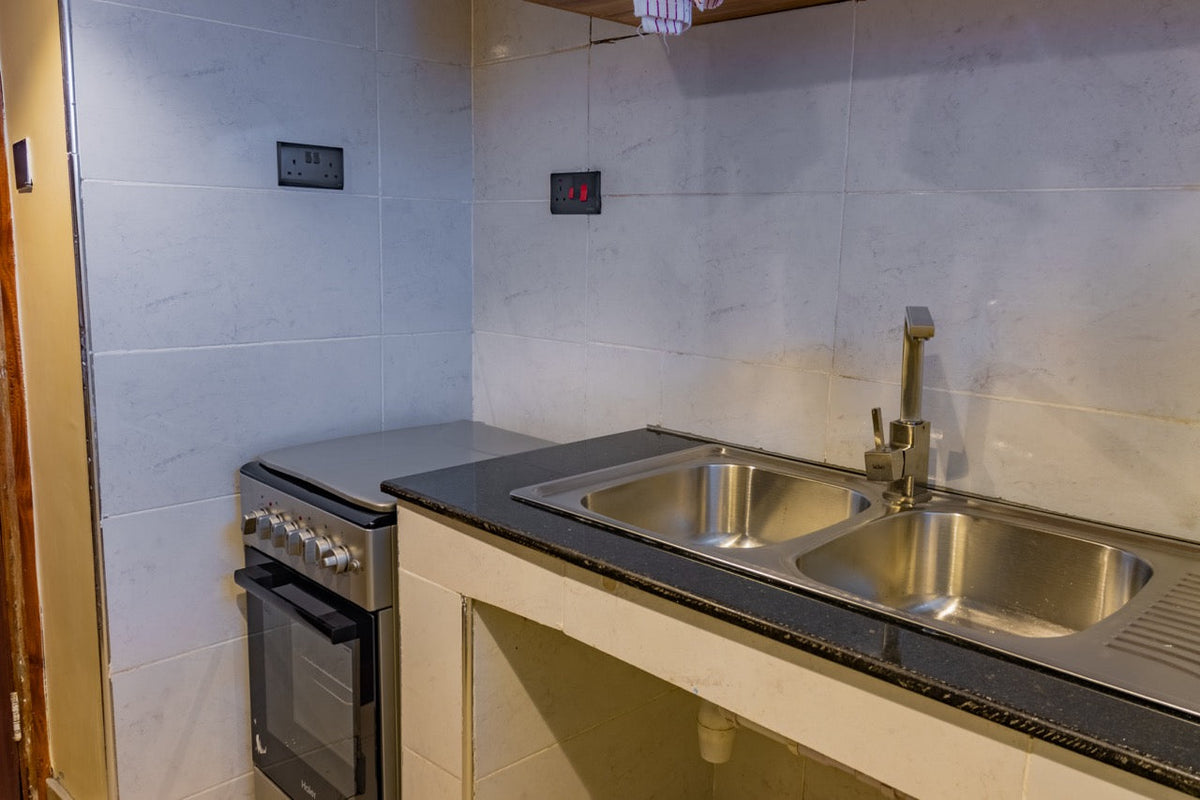 Guest kitchen at Karen Plains Hotel in Karen, Nairobi, part of the long-stay base for slow travel in jacaranda season